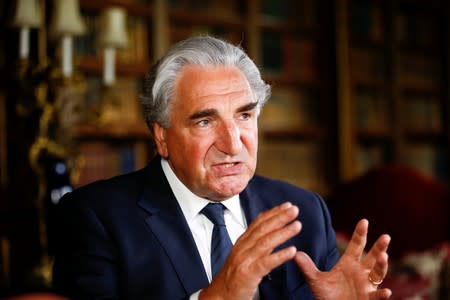 British actor Jim Carter poses during an interview with Reuters at Highclere Castle in Hampshire