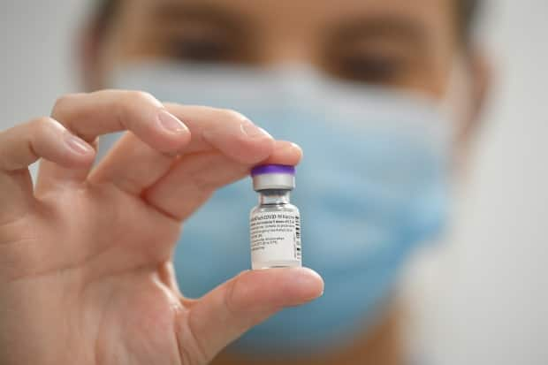 More than 2,200 new cases of COVID-19 were announced in Alberta on Wednesday, the same day Health Canada approved the Pfizer-BioNTech vaccine for use on people aged 12 and older. (Getty Images - image credit)