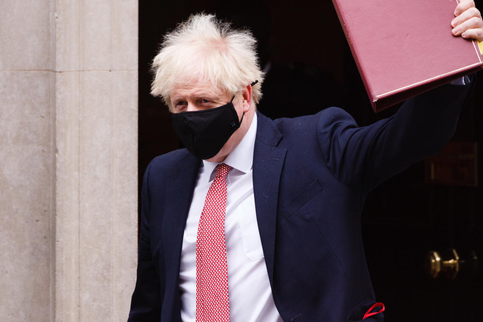 British Prime Minister Boris Johnson leaves 10 Downing Street wearing a face mask, heading for Prime Minister's Questions (PMQs) at the House of Commons in London, England, on October 7, 2020. (Photo by David Cliff/NurPhoto via Getty Images)