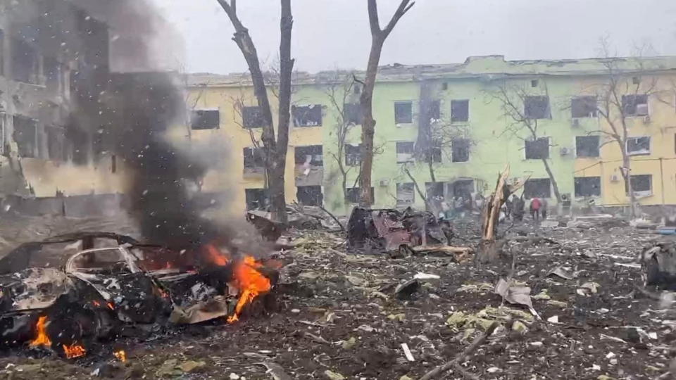 A view shows cars and a building of a hospital destroyed by an aviation strike amid Russia's invasion of Ukraine, in Mariupol, Ukraine, in this handout picture released March 9, 2022.  Press service of the National Police of Ukraine/Handout via REUTERS ATTENTION EDITORS - THIS IMAGE HAS BEEN SUPPLIED BY A THIRD PARTY.     TPX IMAGES OF THE DAY