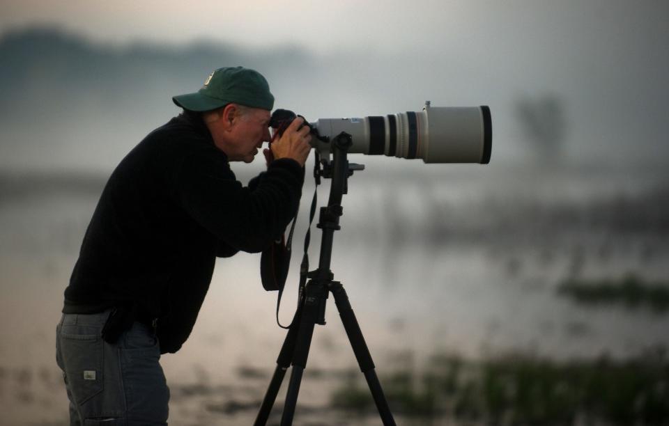 Barry Strouther of Folsom photographs a supermoon gracing the sky over the Cosumnes River Preserve near Thornton.