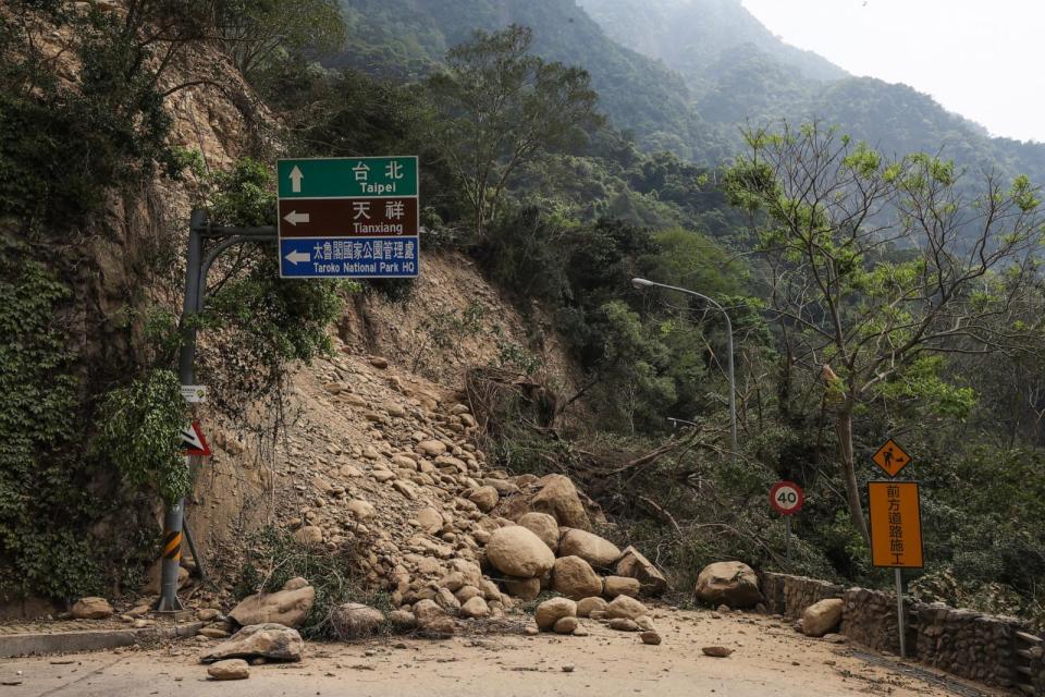 PHOTO: This photo taken by Taiwan's Central News Agency on April 4, 2024 shows a road blocked by fallen rocks in Hualien, after a major earthquake hit Taiwan's east. (CNA/AFP via Getty Images)