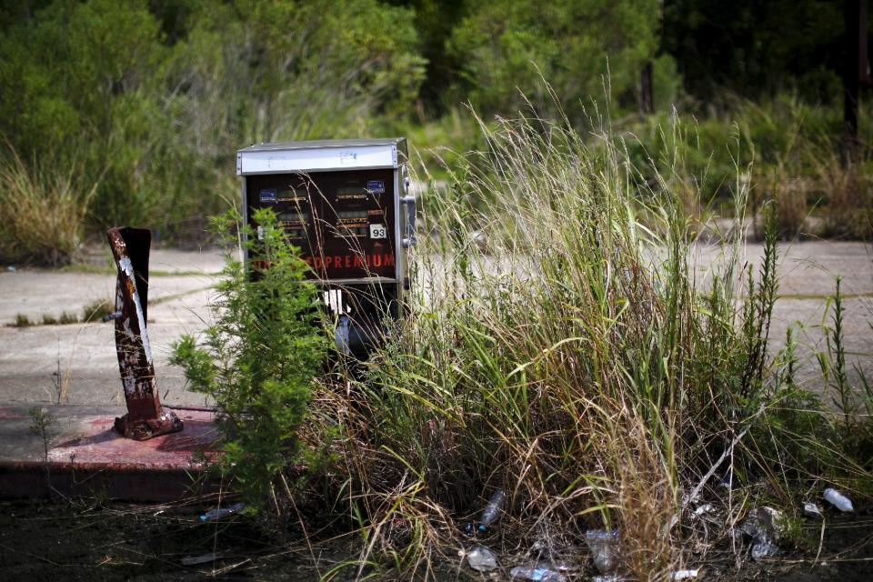 An abandoned gas pump is seen near Port Sulphur, south of New Orleans, Louisiana, August 18, 2015. (REUTERS/Carlos Barria)