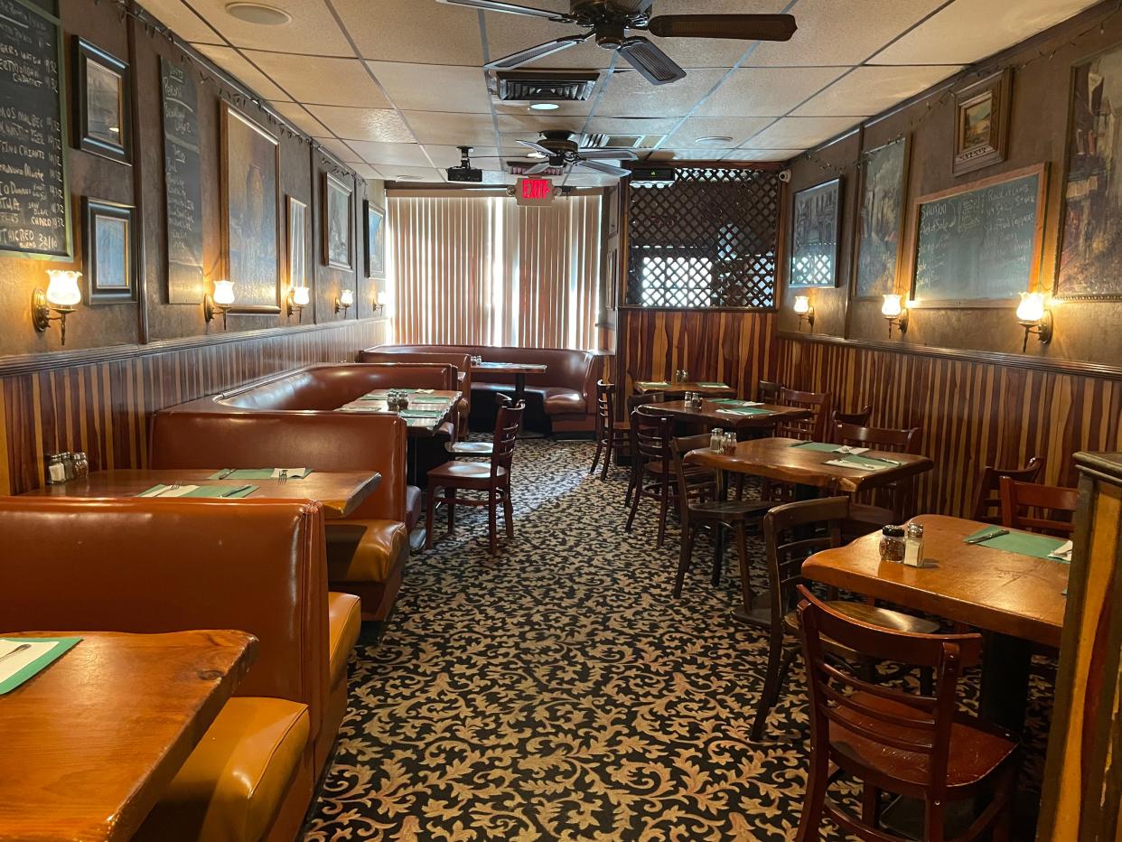 The dining room at Francesco's. The restaurant, which closes this month, feels like a time warp with its old-school booths and tables. Photographed June 20, 2024.