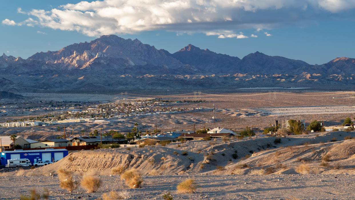 The view over to Spirit Mountain, with an inhabited settlement on the plain below it. 