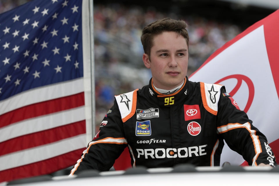 FILE - In this Feb. 16, 2020, file photo, Christopher Bell takes a parade lap in front of fans before the NASCAR Daytona 500 auto race at Daytona International Speedway in Daytona Beach, Fla. Bell understands the path to his new seat at Joe Gibbs Racing was bumpy in that it cost Erik Jones his job. But Bell's current team is closing at the end of the year and if Gibbs didn't pull him into the organization, he's not sure his Cup career would have continued. (AP Photo/John Raoux, File)