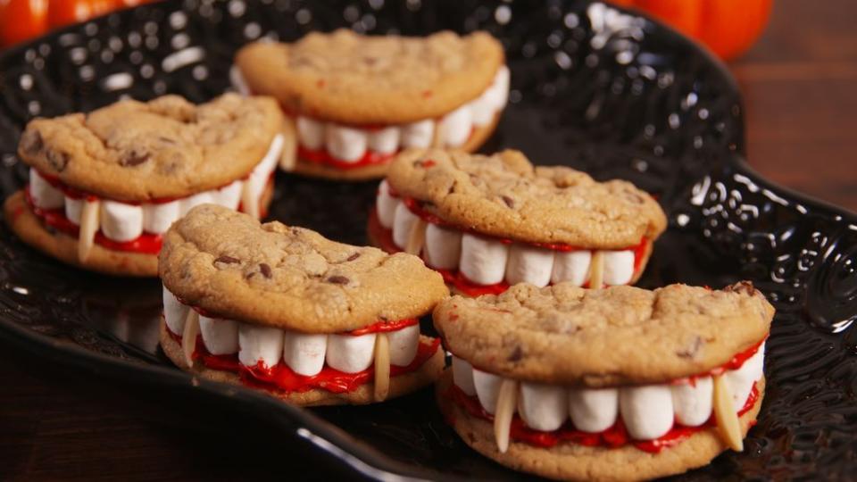 <p>Chomp down on this easy recipe that comes together with a few mini marshmallows, chocolate chip cookies, and red frosting.</p><p><em><a href="https://www.delish.com/cooking/recipe-ideas/recipes/a55668/dracula-dentures-recipe/" rel="nofollow noopener" target="_blank" data-ylk="slk:Get the recipe from Delish »;elm:context_link;itc:0;sec:content-canvas" class="link ">Get the recipe from Delish »</a></em></p>