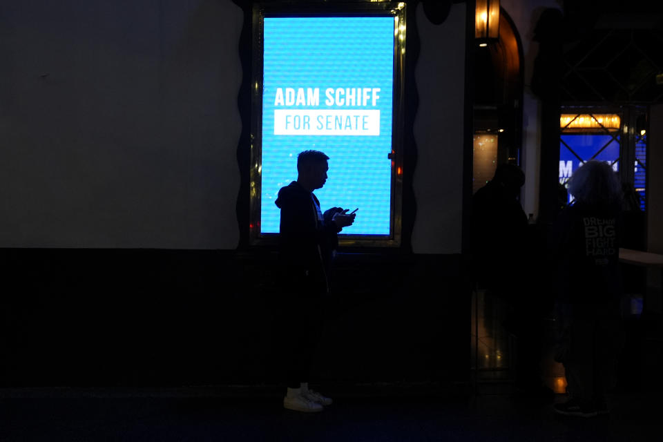 A supporter waits at an election night party for U.S. Rep. Adam Schiff, D-Calif., a U.S. Senate candidate, Tuesday, March 5, 2024, in Los Angeles. (AP Photo/Jae C. Hong)