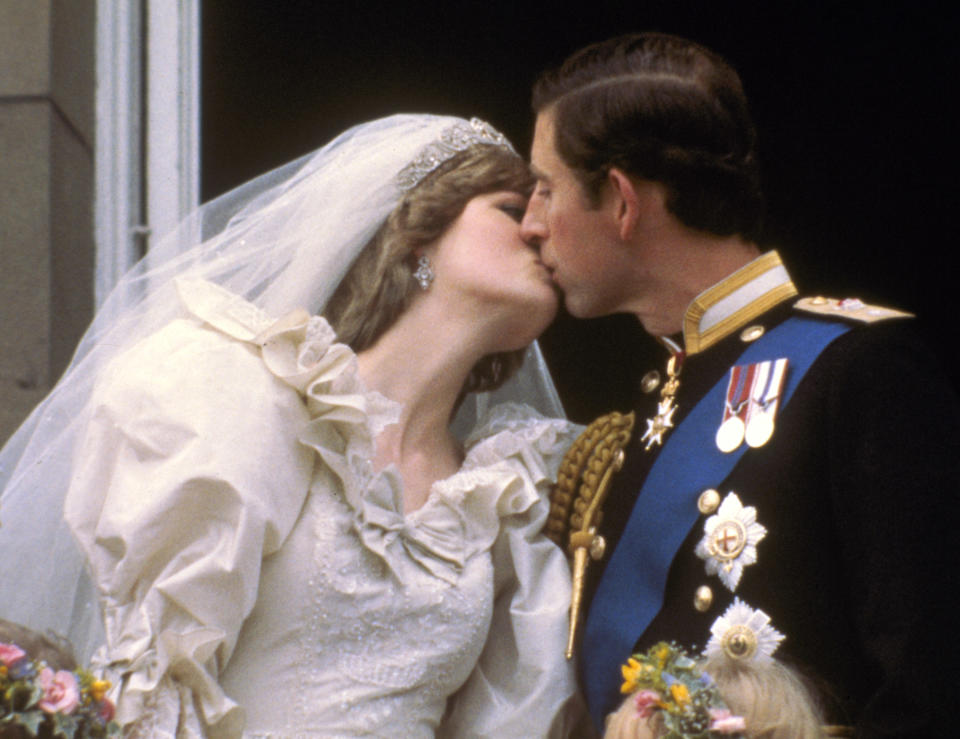 FILE - In this July 29, 1981 file photo, Britain's Prince Charles kisses his bride, the former Diana Spencer, on the balcony of Buckingham Palace in London, after their wedding. Sony Electronics and the Nielsen television research company collaborated on a survey ranking TV's most memorable moments. Other TV events include, the Sept. 11 attacks in 2001, Hurricane Katrina in 2005, the O.J. Simpson murder trial verdict in 1995 and the death of Osama bin Laden in 2011. (AP Photo, file)