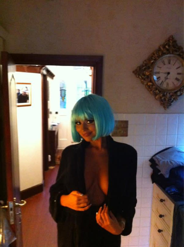 Celebrity photos: Amy Childs has been posing in an assortment of wigs all week, but  it was this blue one which caught our eye. She tweeted: “Loving my blue wigs.” The low cut top and lack of bra was left unexplained, though.