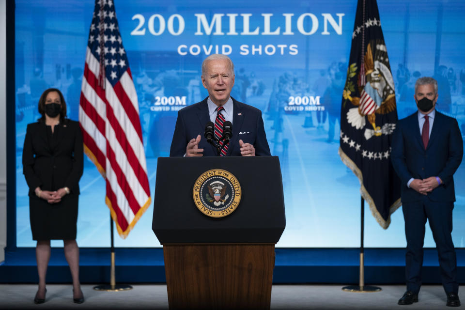 Vice President Kamala Harris, left, and White House COVID-19 Response Coordinator Jeff Zients, right, listen as President Joe Biden speaks about COVID-19 vaccinations at the White House, Wednesday, April 21, 2021, in Washington. (Evan Vucci/AP)