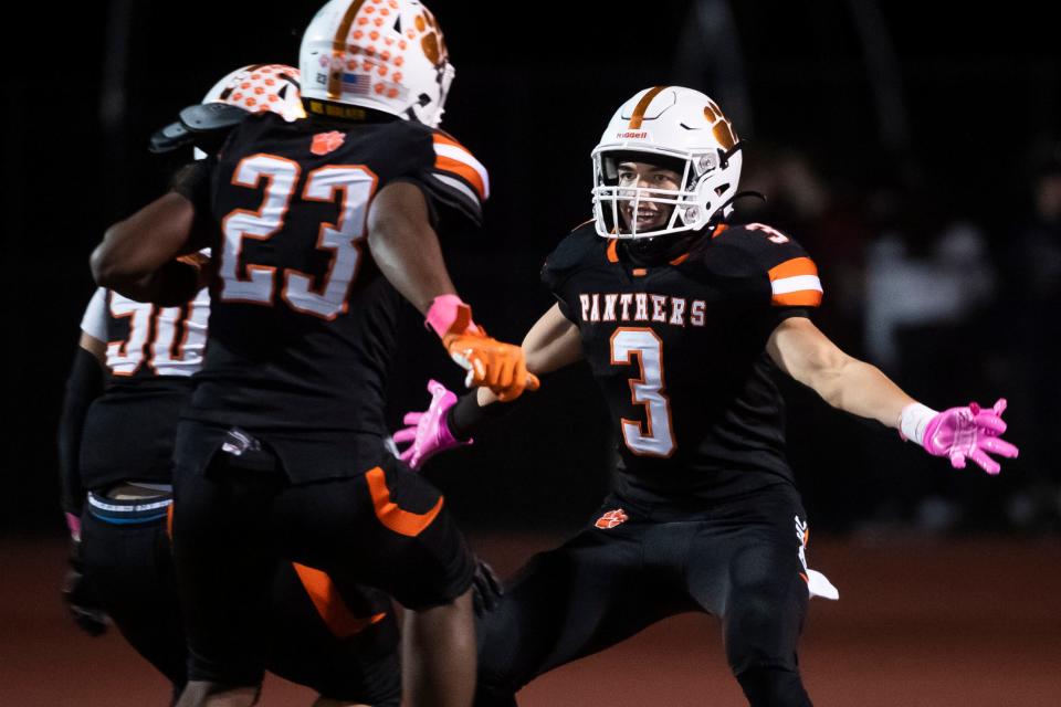 Central York's Ethan Carlos (3) reacts after scoring a touchdown for the Panthers during a YAIAA Division I football game against Red Lion at Central York High School on Friday, Oct. 14, 2022.