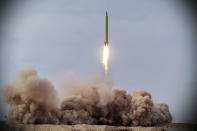 In this photo released on Saturday, Jan. 16, 2021, by the Iranian Revolutionary Guard, a missile is launched in a drill in Iran. Iran’s paramilitary Revolutionary Guard conducted a drill Saturday launching anti-warship ballistic missiles at a simulated target in the Indian Ocean, state television reported, amid heightened tensions over Tehran’s nuclear program and a U.S. pressure campaign against the Islamic Republic. (Iranian Revolutionary Guard/Sepahnews via AP)