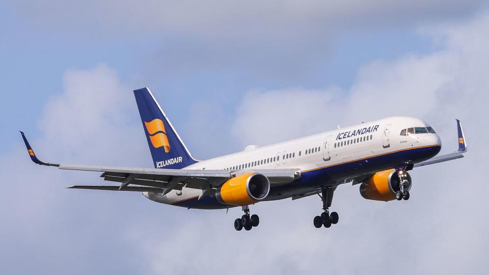A Icelandair Boeing 757-200 in the clouds
