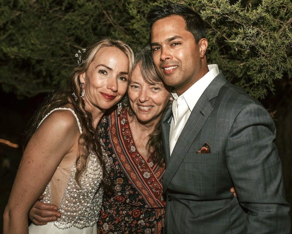 On her wedding day, Christina with her husband, Mark Lauchli, and mother, Sandy Rhoads.