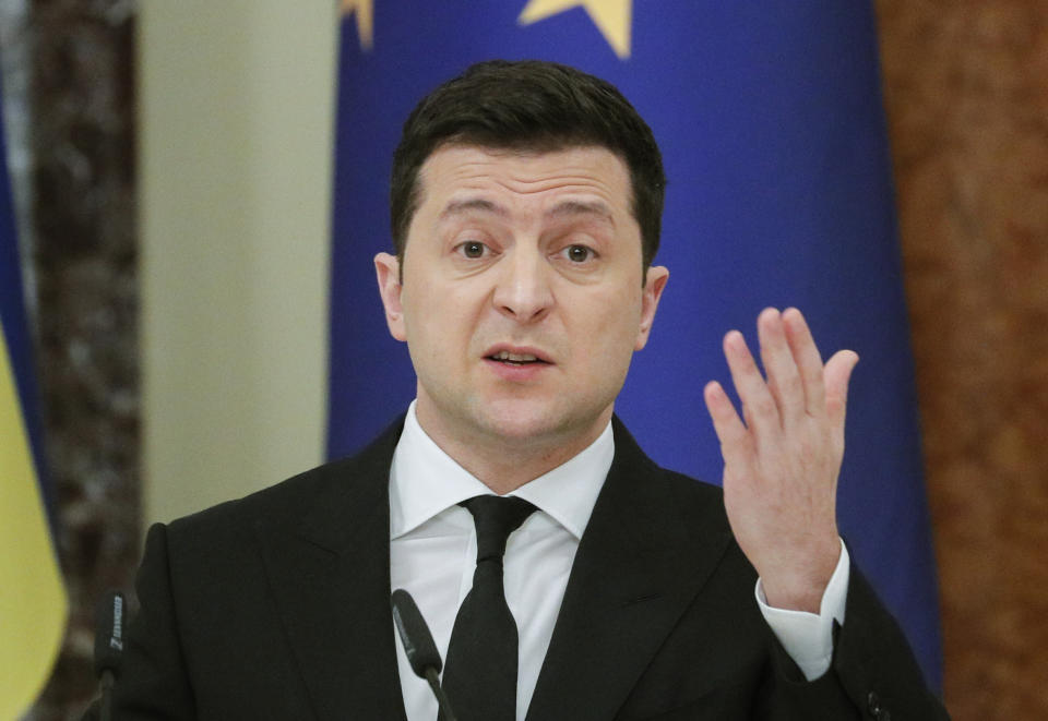 Ukrainian President Volodymyr Zelenskiy talks during a joint media conference with European Council President Charles Michel in Kyiv, Ukraine, Wednesday, March 3, 2021. (Sergiy Dolzhenko/Pool via AP)