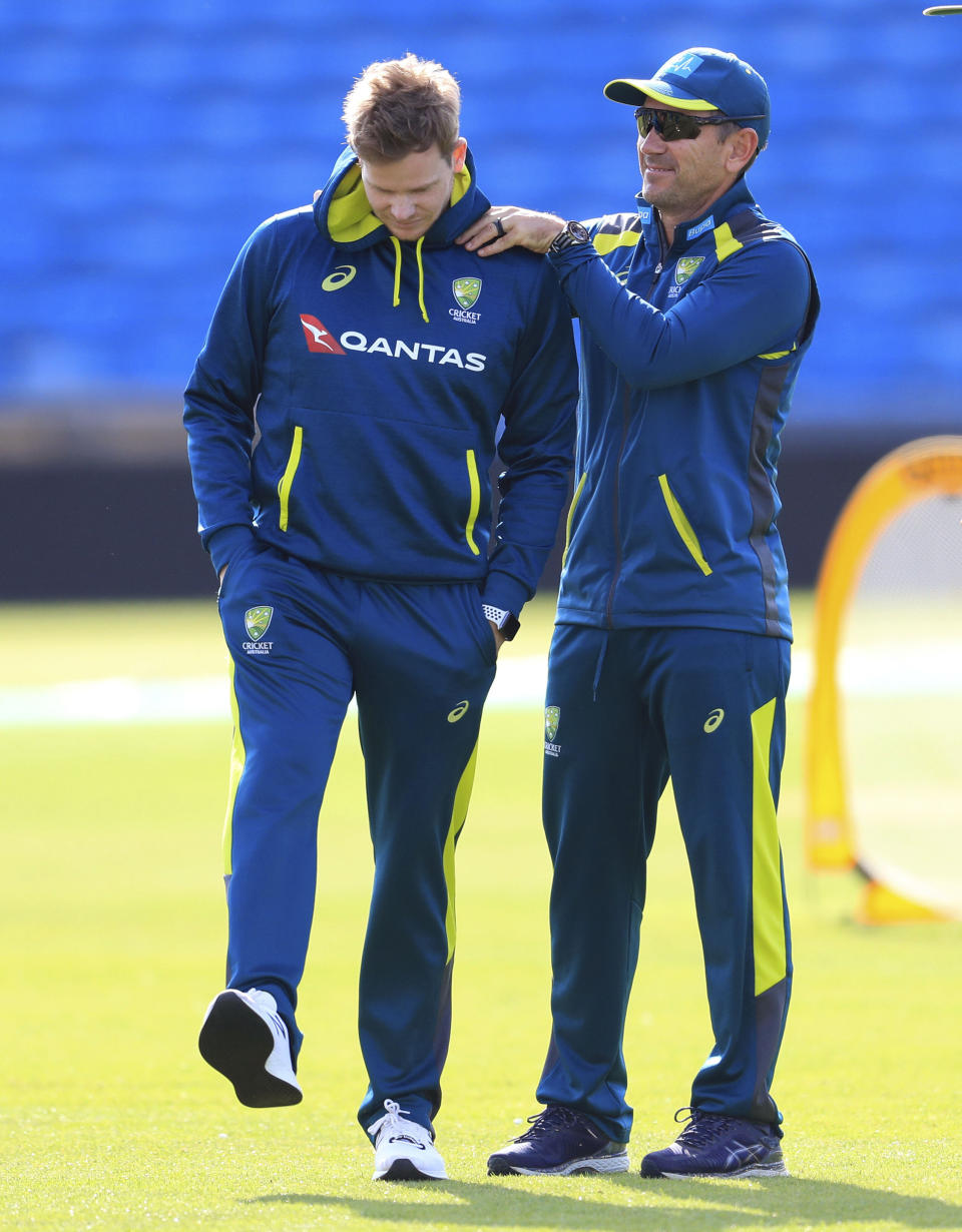 Australia coach Justin Langer, right, and Steve Smith during a nets session at Headingley, Leeds, England, Tuesday Aug. 20, 2019. England and Australia will begin the 3rd Ashes Test cricket match on Aug. 22. (Mike Egerton/PA via AP)