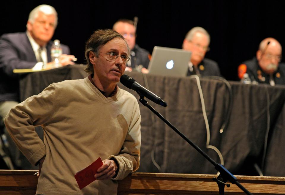 Greg Milne of Hyannisport speaks at a March 2014 meeting in Hyannis.