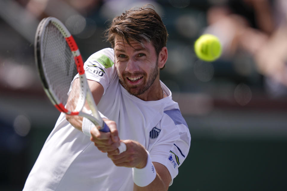 Cameron Norrie, of Great Britain, returns to Lorenzo Sonego, of Italy, at the BNP Paribas Open tennis tournament, Saturday, March 9, 2024, in Indian Wells, Calif. (AP Photo/Ryan Sun)