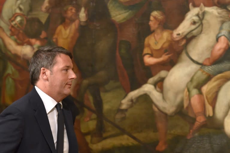 Italy's Prime Minister Matteo Renzi leaves after he announced his resignation at the Palazzo Chigi on December 5, 2016 in Rome