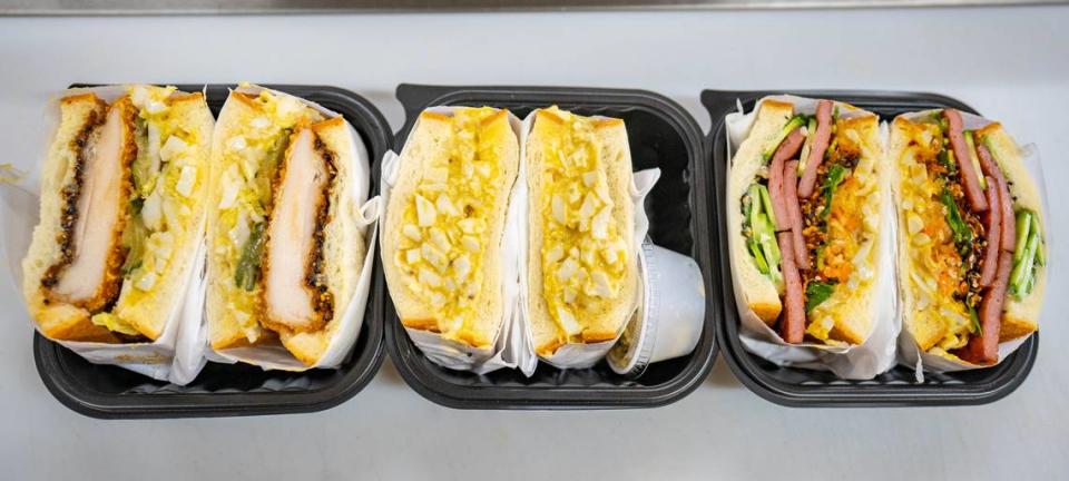 Cluckin’ Katsu, left, Egg Salad, middle, and Spam Musubi, right, are the three main sandos that make up Mecha Mucho’s menu on Thursday, Nov. 16, 2023.