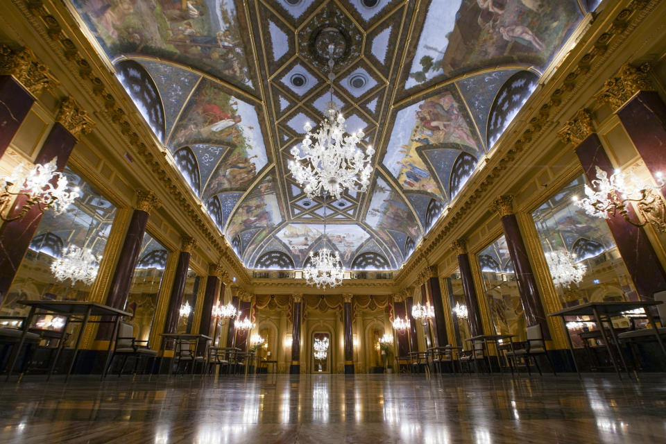 This picture taken Wednesday, May 13, 2020 shows the frescoed ceilings of the Ritz Ballroom of the St. Regis Rome hotel, built in 1894, in Rome. (AP Photo/Andrew Medichini)