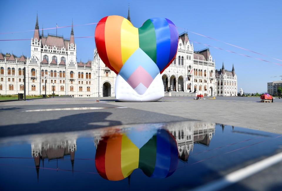 A huge rainbow balloon put up at Hungary’s parliament in protest against anti-LGBT law.  (REUTERS)