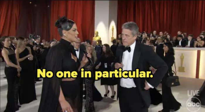 Ashley interviewing Hugh with the caption "No one in particular"