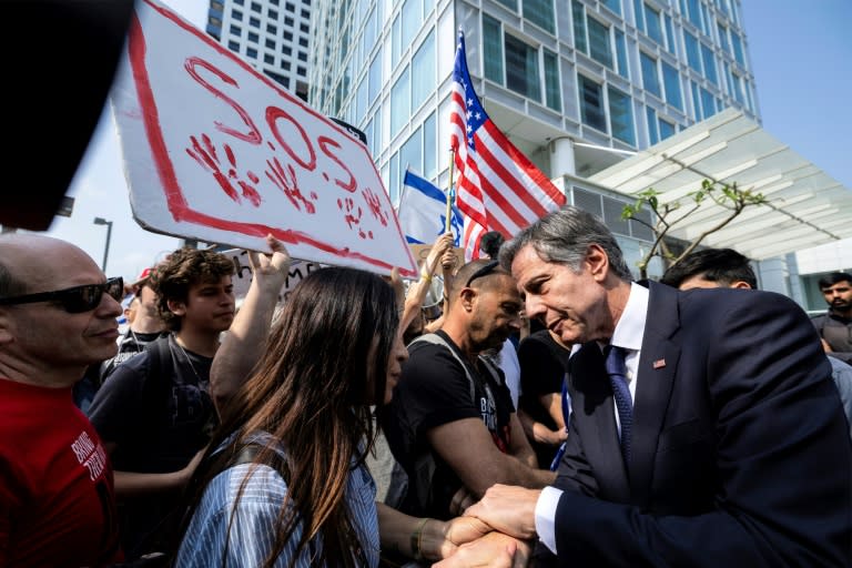US Secretary of State Antony Blinken meets with families of hostages taken by Palestinian militants during the October 7 attacks, as they gather outside a hotel in Tel Aviv on May 1, 2024 (Evelyn Hockstein)