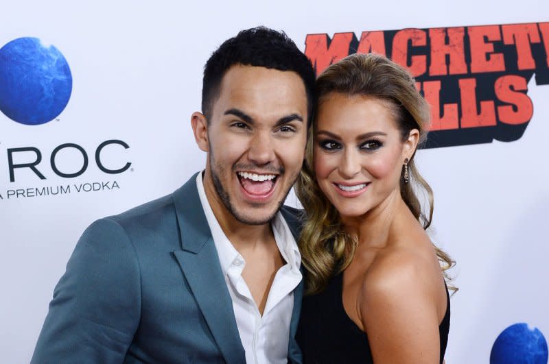 Carlos PenaVega (L) and Alexa PenaVega attend the Los Angeles premiere of "Machete Kills" in 2013. File Photo by Jim Ruymen/UPI