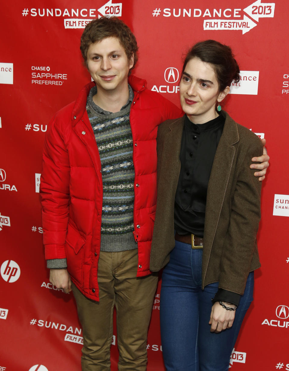 Cast members Michael Cera, left, and Gaby Hoffmann, right, pose at the premiere of "Crystal Fairy" during the 2013 Sundance Film Festival on Thursday, Jan. 17, 2013 in Park City, Utah. (Photo by Danny Moloshok/Invision/AP)