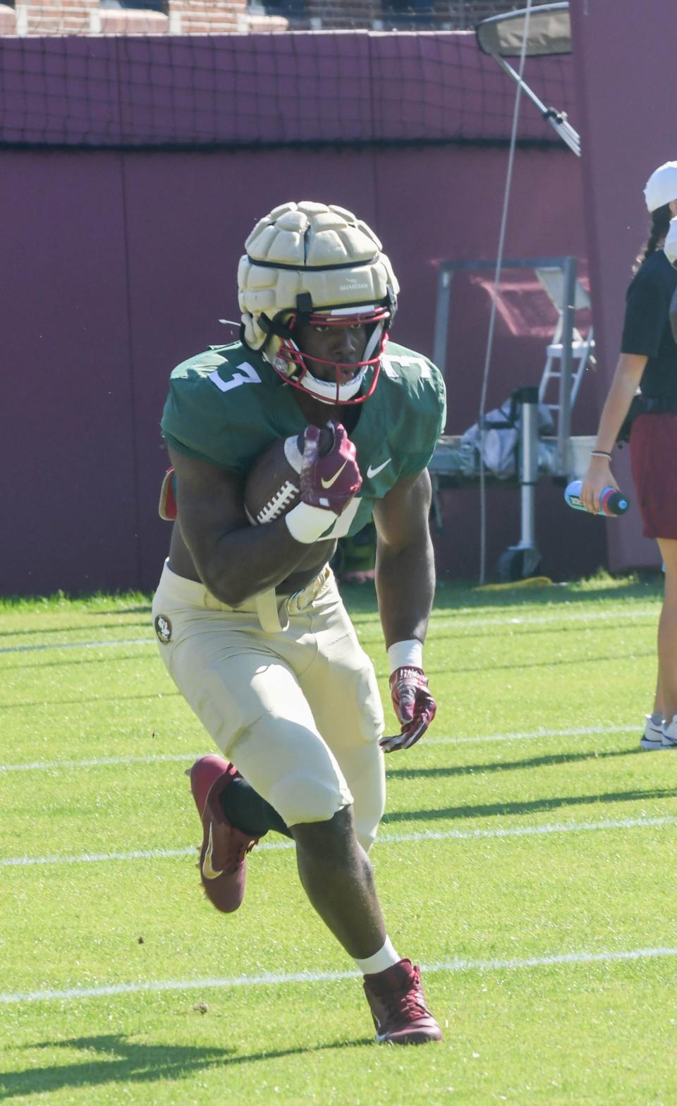 Florida State football players take part in drills during an FSU spring football practice of the 2023 season on Thursday, March 30.