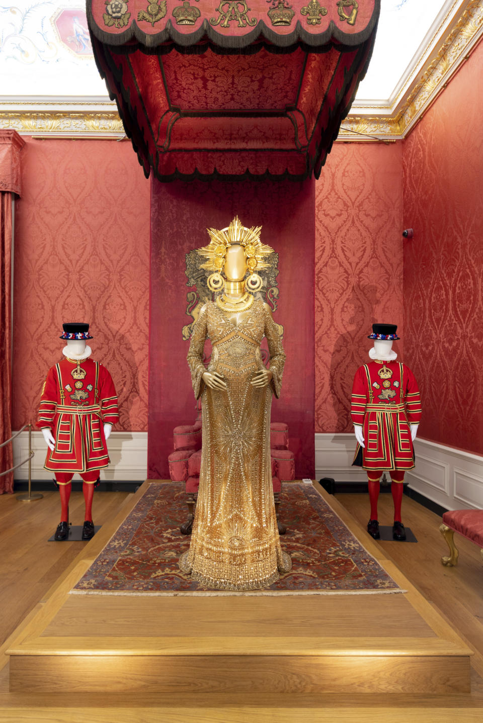 The Presence Chamber displaying the Peter Dundas ensemble worn by Beyonce for the Grammy's 2017.

Crown to Couture, a major exhibition at Kensington Palace, examines and celebrates how fashion from the royal Georgian court has inspired red-carpet catwalk designs in the 21st century. Crown to Couture 5th April – 29th October 2023.