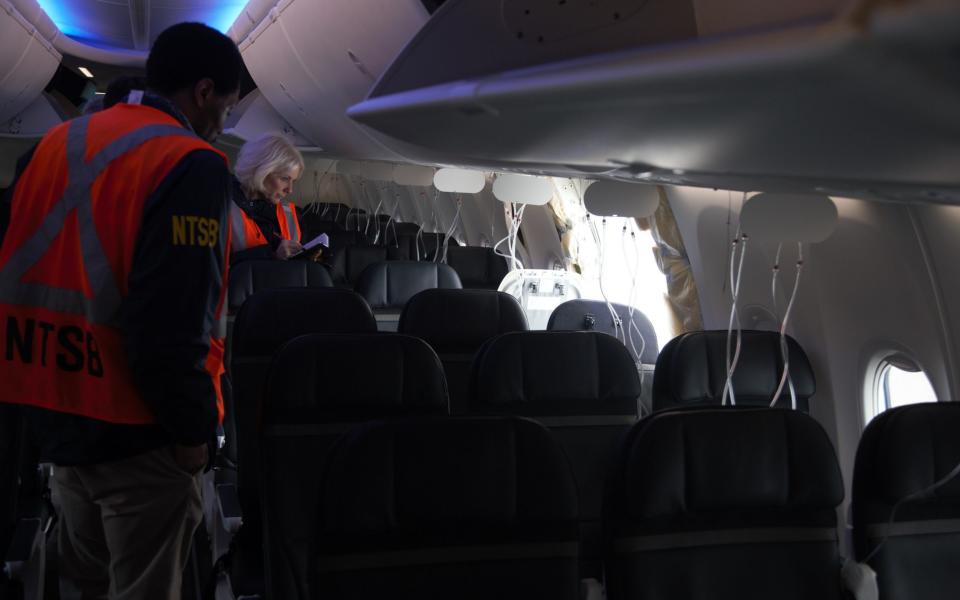 The National Transportation Safety Board staff investigate the sudden fuselage failure on the Alaska Airlines Boeing 737-9 MAX