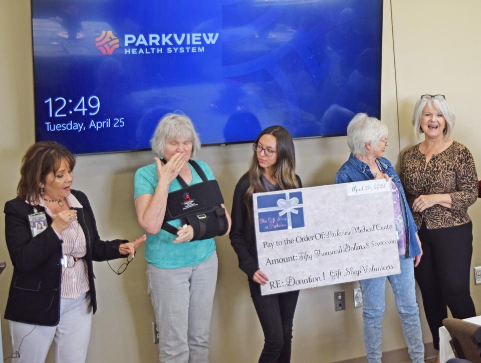 Parkview Gift Shoppe volunteers present a $50,000 check to the Parkview Foundation. The volunteers raised the funds to help with remodeling and upgrading the surgical waiting room in the main hospital.