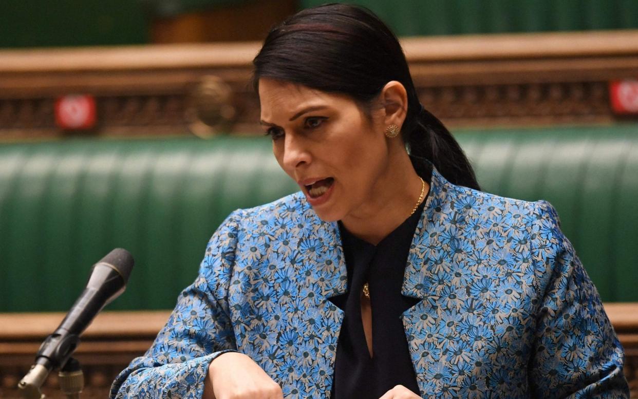 Priti Patel is is proposing that those who get asylum will only be granted 'temporary protection status' - Jessica Taylor/AFP