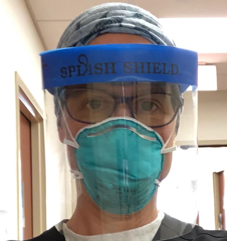 The author, shown wearing protective gear, returned to work in the emergency department of her hospital on July 3, 2020. (Photo: Courtesy of Christine Zink)