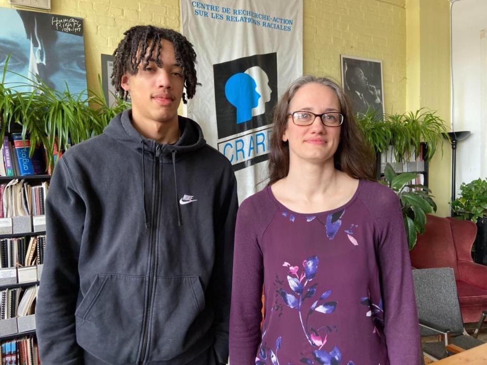 Aiden Chase, left, and his mother, Laurie Philipps, are filing a complaint against Hockey Quebec with the Quebec Human Rights and Youth Rights Commission after the teen was allegedly subjected to racial slurs.  (Rowan Kennedy/CBC - image credit)