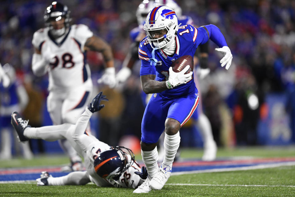 Buffalo Bills' Stefon Diggs runs with the ball during the first half of an NFL football game against the Denver Broncos, Monday, Nov. 13, 2023, in Orchard Park, N.Y. (AP Photo/Adrian Kraus)