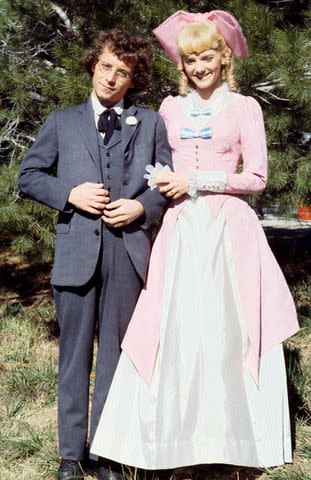 <p>NBCU Photo Bank/NBCUniversal via Getty</p> Steve Tracy and Alison Arngrim in 'Little House on the Prairie' during season 6.