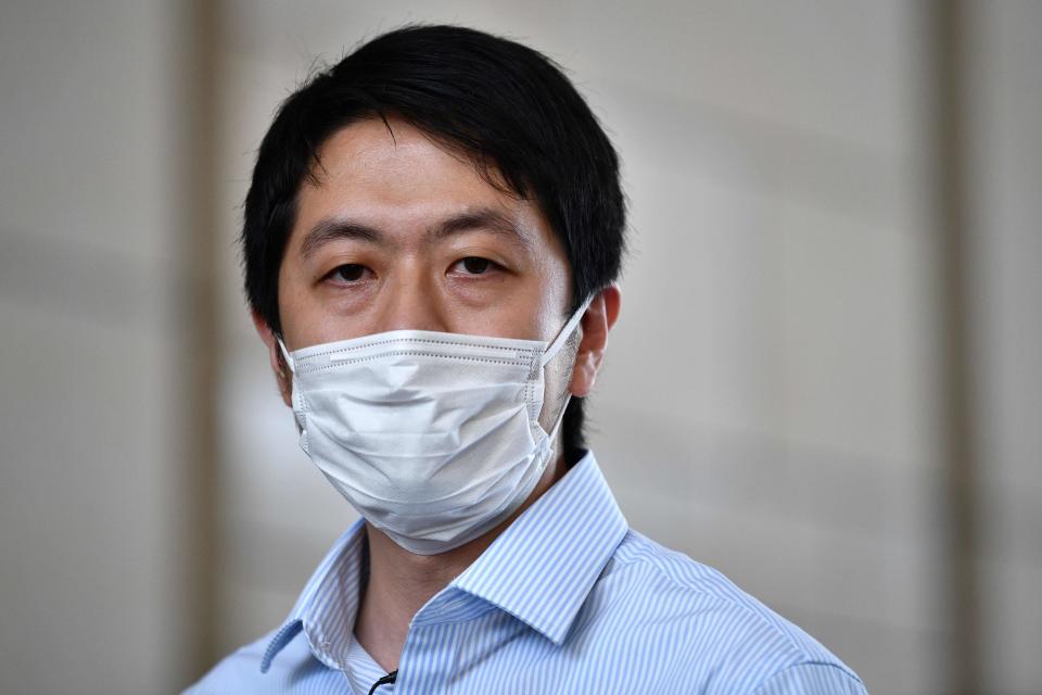 Pro-democracy lawmaker Ted Hui speaks to the media outside the West Kowloon Court in Hong Kong on August 24, 2020, after the court threw out two private prosecutions -- including one against a police officer who shot a pro-democracy protester last year -- following a rare intervention from the financial hub's justice secretary. (Photo by Anthony WALLACE / AFP) (Photo by ANTHONY WALLACE/AFP via Getty Images)