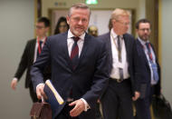 Danish Foreign Minister Anders Samuelsen, center, arrives for a General Affairs Council meeting at the Europa building in Brussels, Tuesday, Dec. 11, 2018. Top European Union officials ruled out Tuesday any renegotiation of the divorce agreement with Britain as Prime Minister Theresa May launched her fight to save her Brexit deal by lobbying leaders in Europe's capitals. (AP Photo/Virginia Mayo)