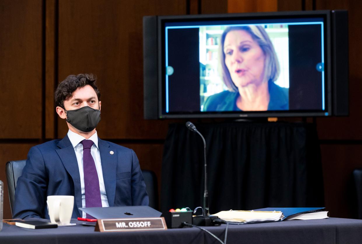 Sen. Jon Ossoff (D-Ga.) listens as Jan Jones, speaker pro tempore in the Georgia House of Representatives, speaks during a Senate Judiciary Committee hearing on Capitol Hill on Tuesday. The committee is hearing testimony on voting rights in the U.S.  (Photo: Photo by Bill Clark-Pool/Getty Images)