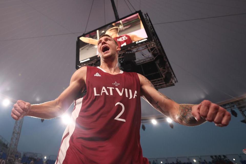 Karlis Lasmanis of Latvia celebrates in the 3x3 basketball competition.