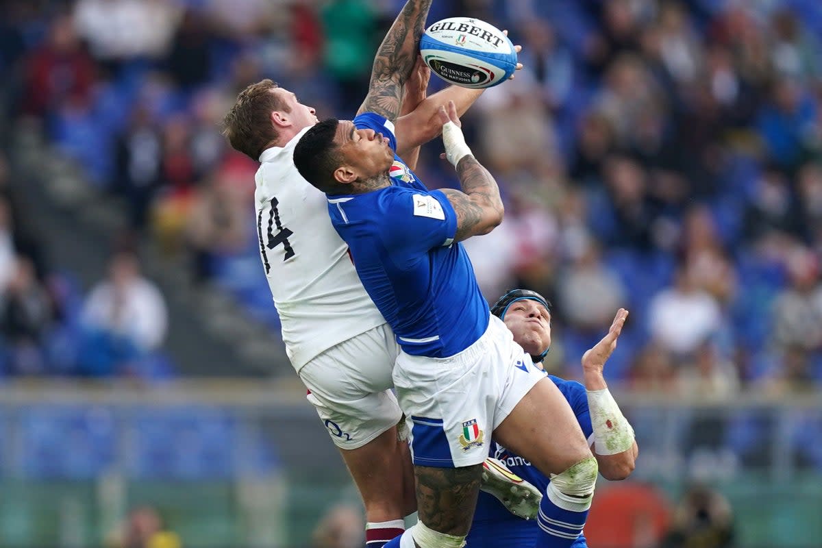 England’s Max Malins (left) battles with Italy’s Montanna Ioane (centre) in the corresponding match last year (PA) (PA Archive)