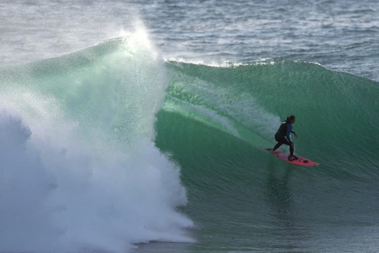 Brazilian surfer Maya Gabeira rides a wave during a training session at Praia do Norte in Nazare, central Portugal