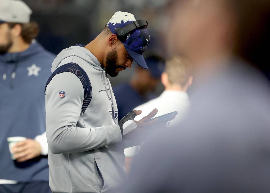Dallas Cowboys injured quarterback Dak Prescott watches from the sidelines on Sunday, September 18, 2022.