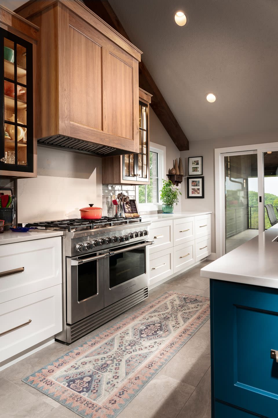 kitchen with island and wood range hood