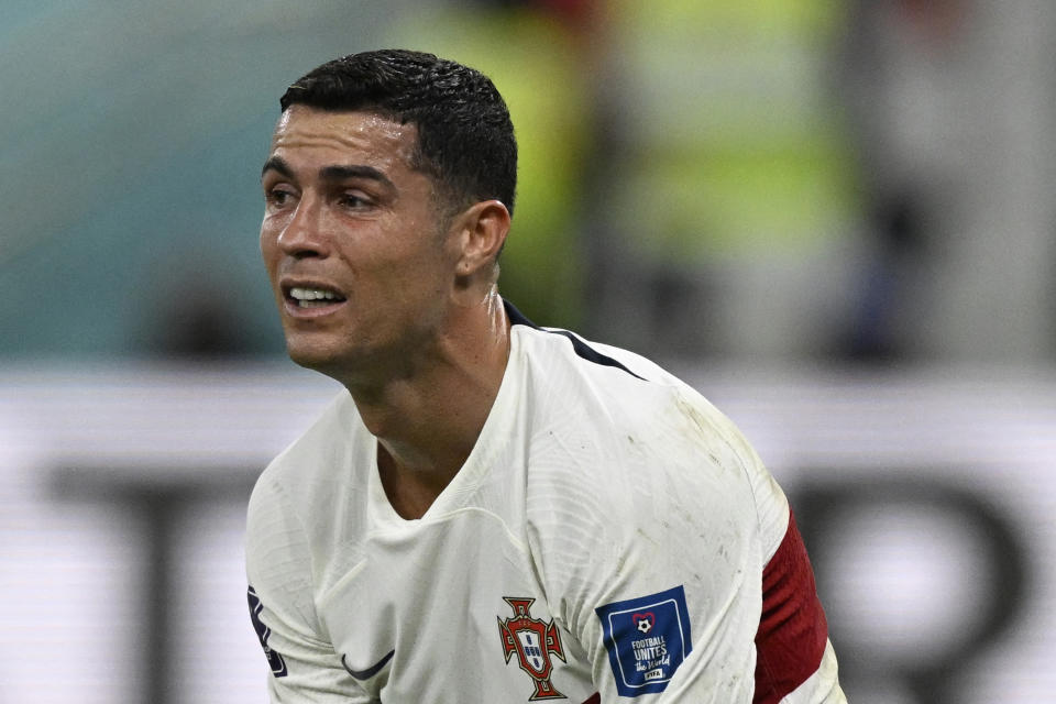 Portugal's forward #07 Cristiano Ronaldo reacts after his team lost the Qatar 2022 World Cup quarter-final football match between Morocco and Portugal at the Al-Thumama Stadium in Doha on December 10, 2022. (Photo by PATRICIA DE MELO MOREIRA / AFP) (Photo by PATRICIA DE MELO MOREIRA/AFP via Getty Images)