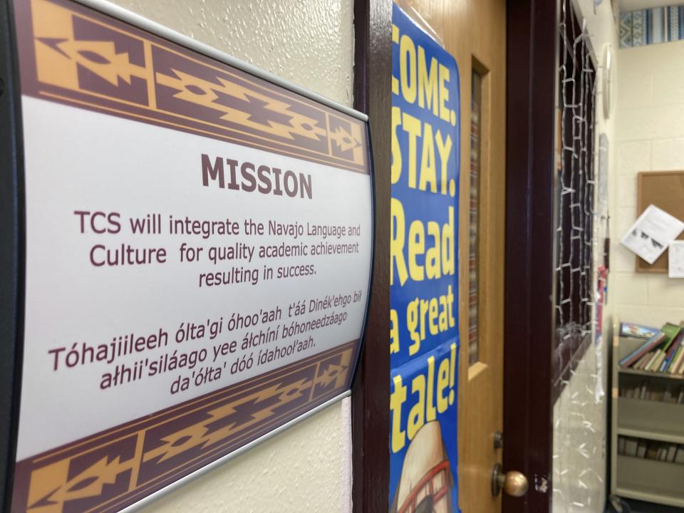 This Feb. 17, 2023 image shows one of the Navajo language signs in the school library in To'Hajiilee, New Mexico. To'Hajiilee Community School is just one of dozens funded by the U.S. Bureau of Indian Education that are in desperate need of repair or replacement. The agency estimates it would cost roughly $6.2 billion to address the needs of those schools in poor condition. (AP Photo/Susan Montoya Bryan)